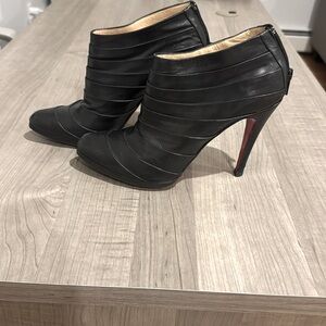 Christian Louboutin black leather booties. 38.5 / fits my size 8.